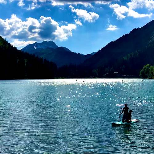 Summer In Morzine - paddleboarding on lake montriond